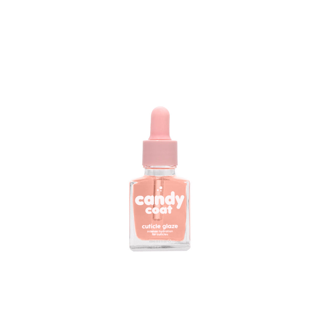A bottle of Cuticle Glaze with a pink cap and a dropper, labeled 'Candy Coat' and scented with 'Berries'.